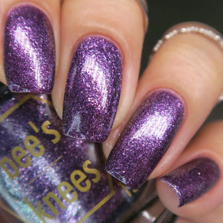 Image provided for Bee's Knees by a paid swatcher featuring the nail polish " Nevermore "