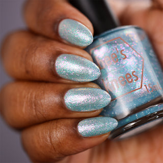 Image provided for Bee's Knees by a paid swatcher featuring the nail polish " Heartbreak "