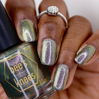 Image provided for Bee's Knees by a paid swatcher featuring the nail polish " Denial "