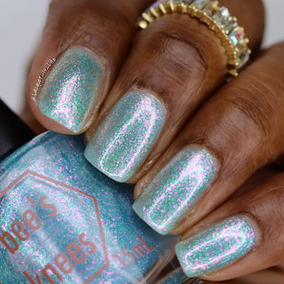 Image provided for Bee's Knees by a paid swatcher featuring the nail polish " Heartbreak "
