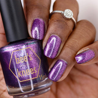 Image provided for Bee's Knees by a paid swatcher featuring the nail polish " Nevermore "