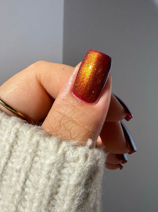 Image provided for Bee's Knees by a paid swatcher featuring the nail polish " The Bar is in Hell "