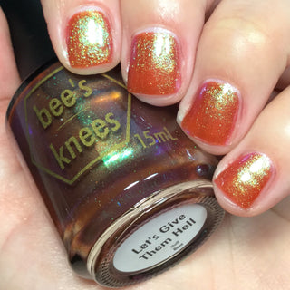 Image provided for Bee's Knees by a paid swatcher featuring the nail polish " Let's Give Them Hell "