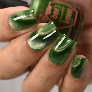 Image provided for Bee's Knees by a paid swatcher featuring the nail polish " Believing Something does not Make it True "