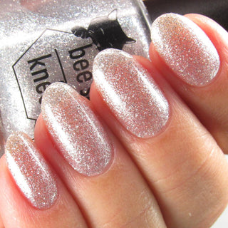 Image provided for Bee's Knees by a paid swatcher featuring the nail polish " Hold Your Unicorns "