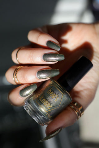 Image provided for Bee's Knees by a paid swatcher featuring the nail polish " Denial "