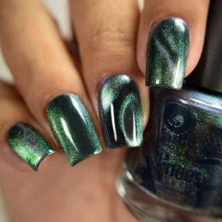 Image provided for Bee's Knees by a paid swatcher featuring the nail polish " Midnight Yoga and Seaweed "