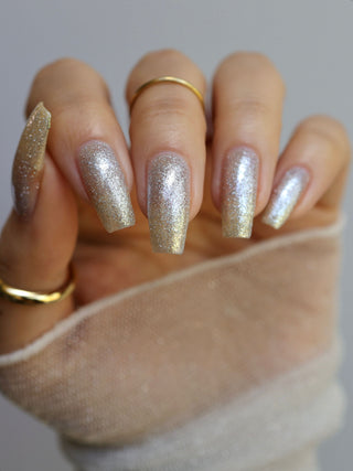 Image provided for Bee's Knees by a paid swatcher featuring the nail polish " Hold Your Unicorns "