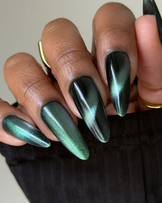 Image provided for Bee's Knees by a paid swatcher featuring the nail polish " Midnight Yoga and Seaweed "