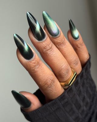 Image provided for Bee's Knees by a paid swatcher featuring the nail polish " Midnight Yoga and Seaweed "