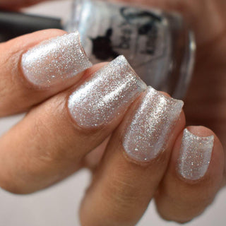 Image provided for Bee's Knees by a paid swatcher featuring the nail polish " Hold Your Unicorns "