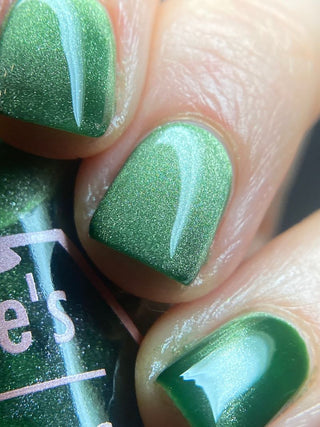 Image provided for Bee's Knees by a paid swatcher featuring the nail polish " Believing Something does not Make it True "