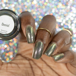 Image provided for Bee's Knees by a paid swatcher featuring the nail polish " Denial "