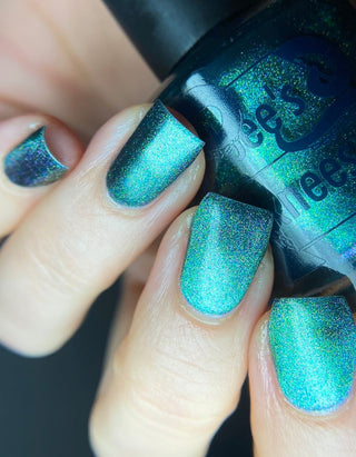 Image provided for Bee's Knees by a paid swatcher featuring the nail polish " Midnight Yoga and Seaweed "