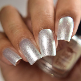Image provided for Bee's Knees by a paid swatcher featuring the nail polish " Maman "
