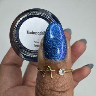 Image provided for Bee's Knees by a paid swatcher featuring the nail polish " Thalassophilia "
