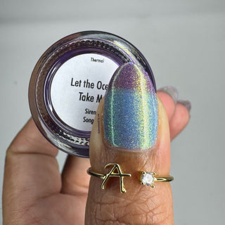 Image provided for Bee's Knees by a paid swatcher featuring the nail polish " Let the Ocean Take Me "