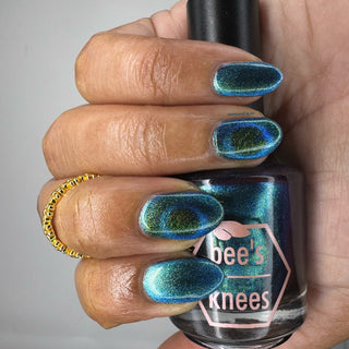 Image provided for Bee's Knees by a paid swatcher featuring the nail polish " The Pond Spirit "