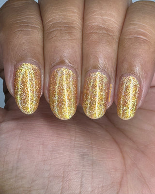 Image provided for Bee's Knees by a paid swatcher featuring the nail polish " The Golden Path "