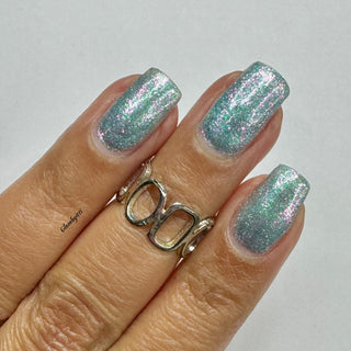 Image provided for Bee's Knees by a paid swatcher featuring the nail polish " Heartbreak "