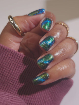 Image provided for Bee's Knees by a paid swatcher featuring the nail polish " The Pond Spirit "