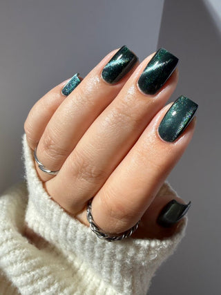 Image provided for Bee's Knees by a paid swatcher featuring the nail polish " Midnight Yoga and Seaweed "