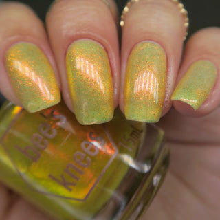 Image provided for Bee's Knees by a paid swatcher featuring the nail polish " Sunbird "