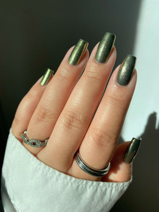 Image provided for Bee's Knees by a paid swatcher featuring the nail polish " Denial "