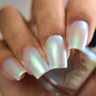 Image provided for Bee's Knees by a paid swatcher featuring the nail polish " Only Monsters Play God "