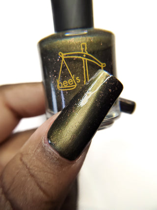 Image provided for Bee's Knees by a paid swatcher featuring the nail polish " Stormfall "