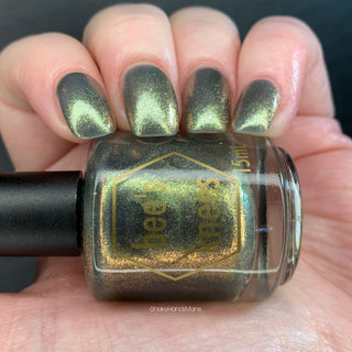 Image provided for Bee's Knees by a paid swatcher featuring the nail polish " Denial "