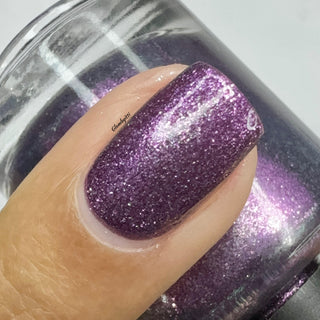 Image provided for Bee's Knees by a paid swatcher featuring the nail polish " Nevermore "