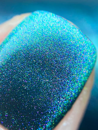 Image provided for Bee's Knees by a paid swatcher featuring the nail polish " Midnight Yoga and Seaweed "