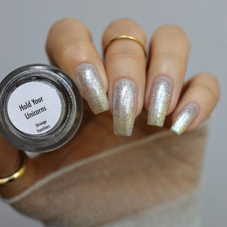 Image provided for Bee's Knees by a paid swatcher featuring the nail polish " Hold Your Unicorns "