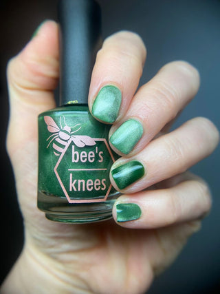 Image provided for Bee's Knees by a paid swatcher featuring the nail polish " Believing Something does not Make it True "