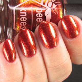 Image provided for Bee's Knees by a paid swatcher featuring the nail polish " The Dark Angel "