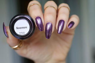 Image provided for Bee's Knees by a paid swatcher featuring the nail polish " Nevermore "